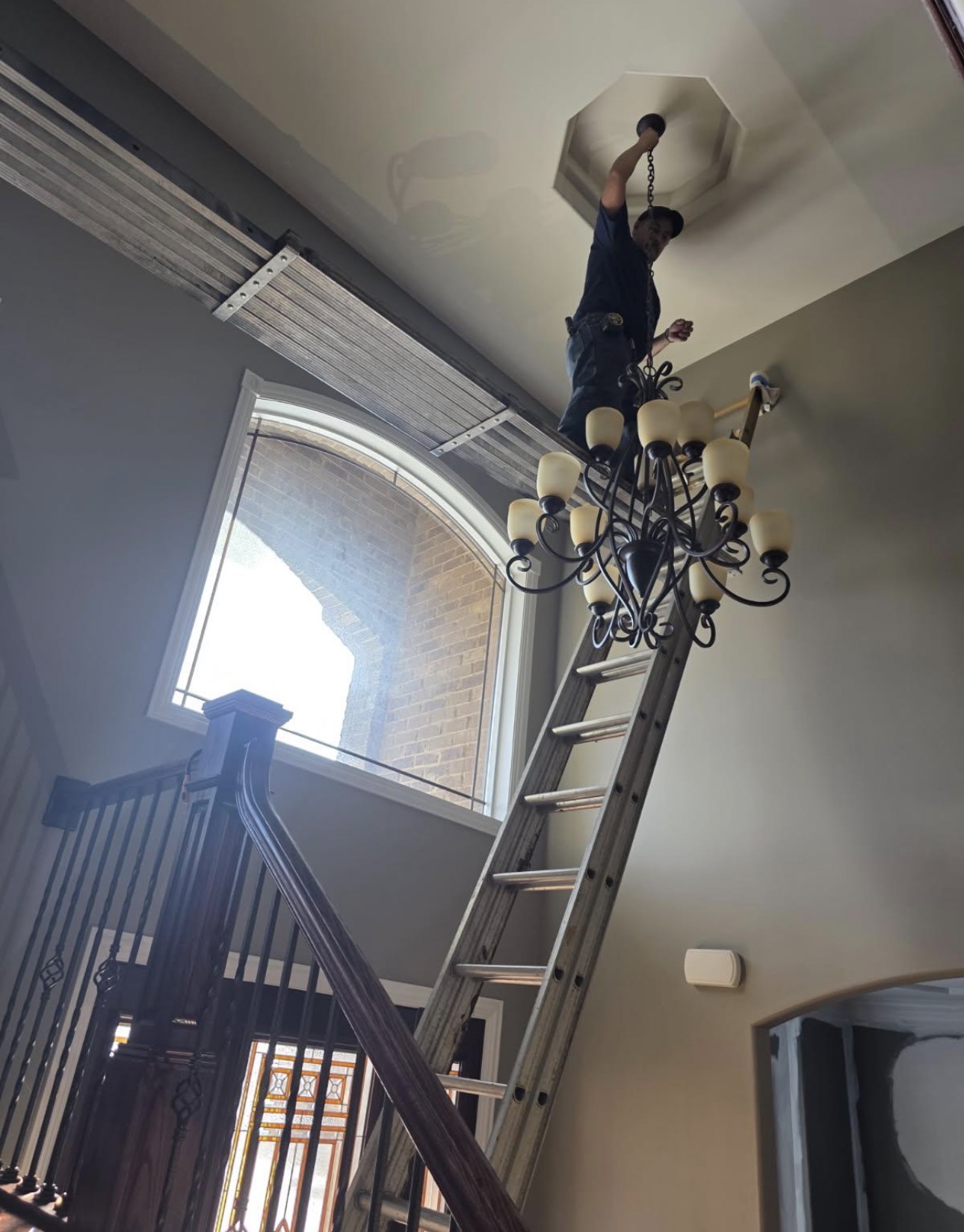 High-ceiling chandelier install